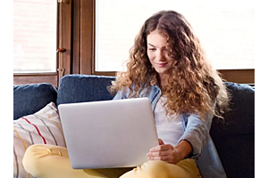 A girl working on her laptop
