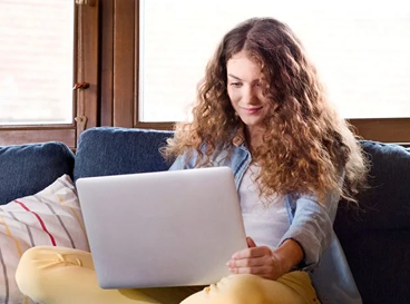 A girl working on her laptop