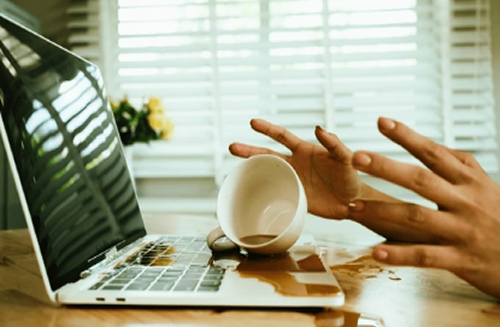 Coffee spill on a laptop