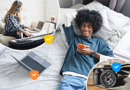 College Students in Dorm with Laptop, music keyboard, headphones and broken camera