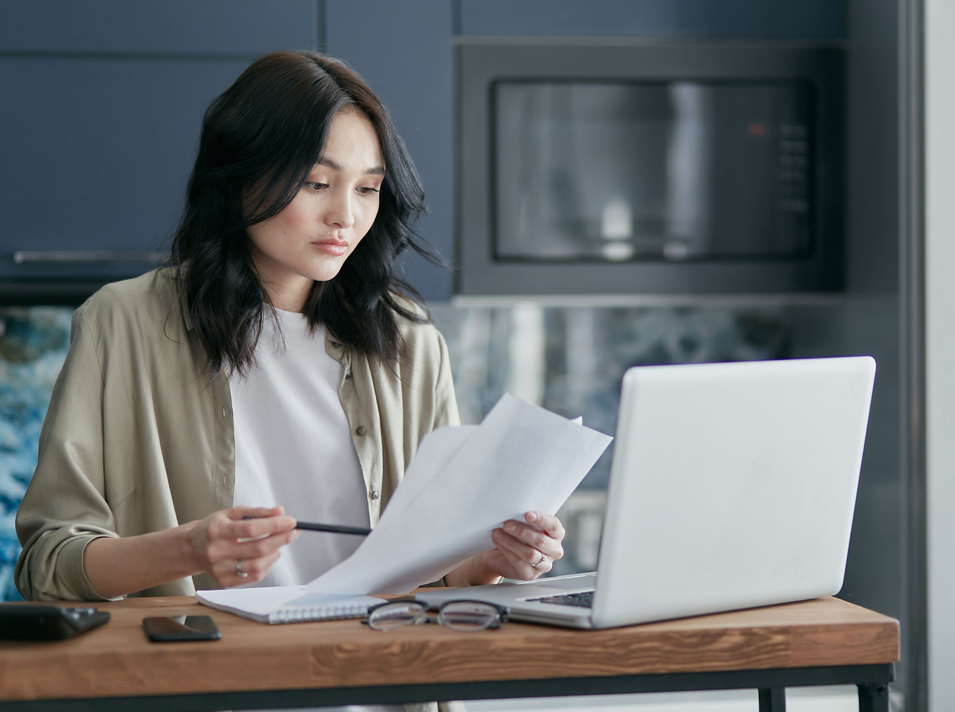 Parent reviewing homeowners insurance policy